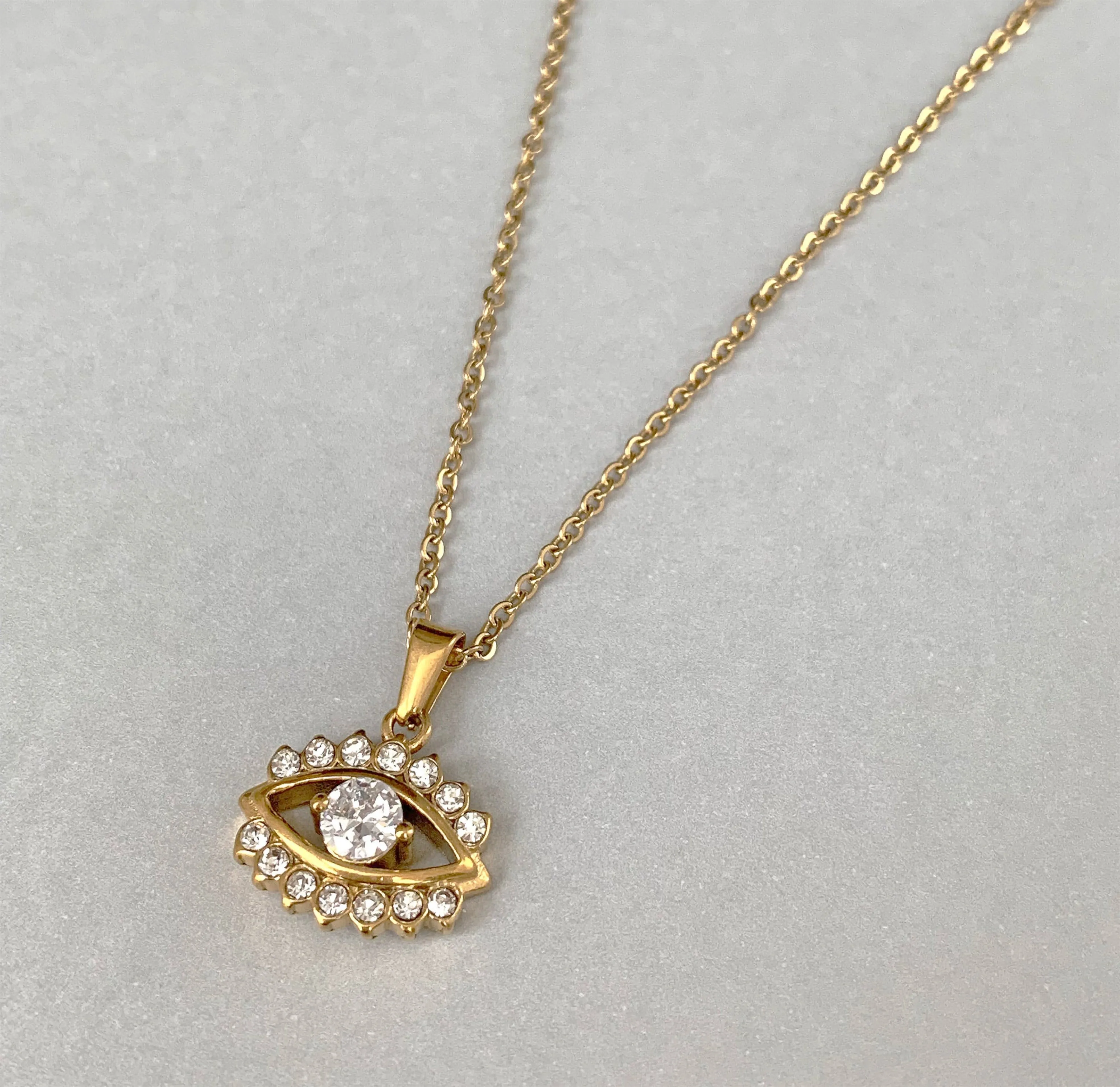 CECILE GOLD EVIL EYE PENDANT NECKLACE