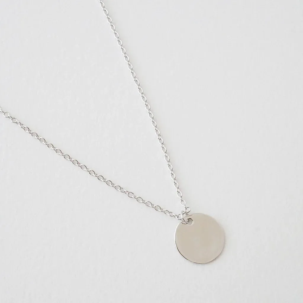 hanging sun disc necklace