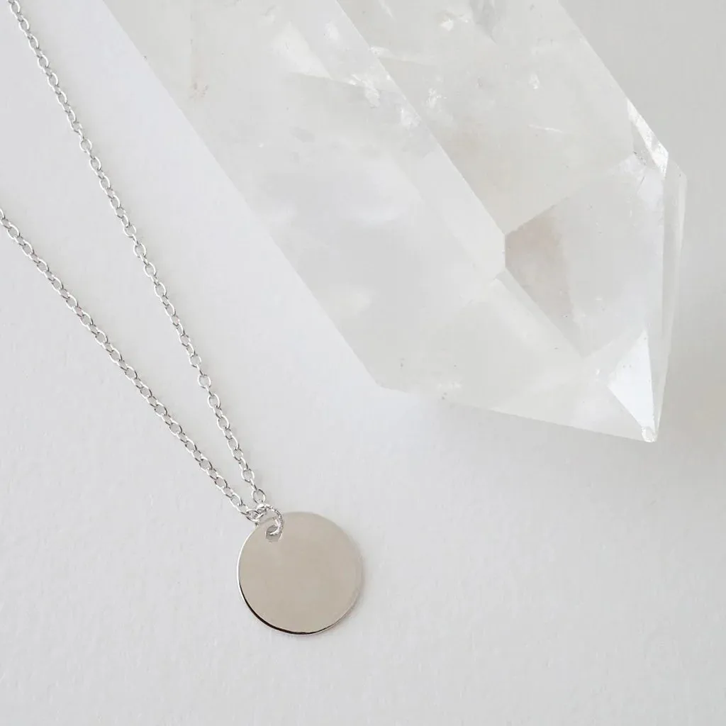 hanging sun disc necklace