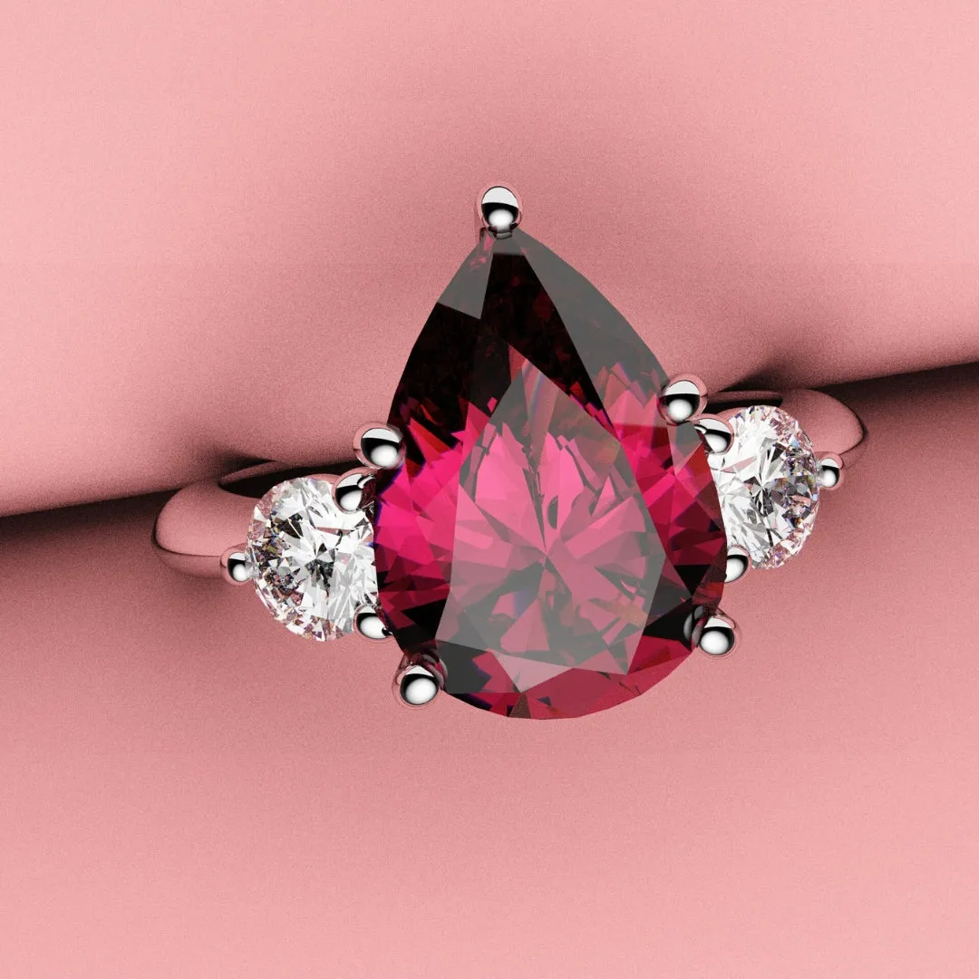 Pear Ruby Trilogy Engagement Ring