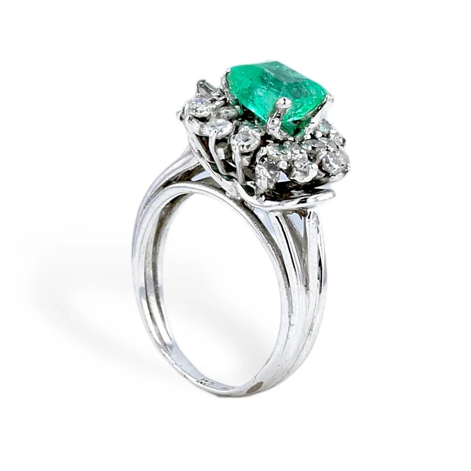 Platinum and emerald diamond ring